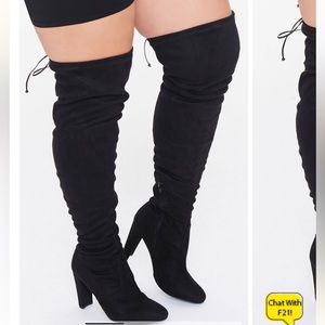 Thigh high black boots